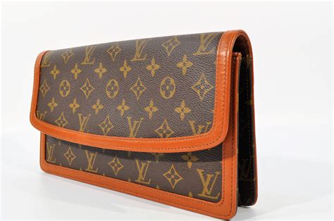 canvas louis vuitton clutch|authentic louis vuitton clutch.